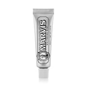 A squeeze tube of Marvis Whitening Mint toothpaste on a clean white background. Shop Meriton Suites.