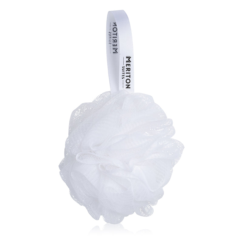 White bath pouf with 'Meriton Suites' branding on a white background. Shop Meriton Suites.