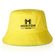 Yellow bucket hat with Meriton Suites logo on a white background. Shop Meriton Suites.