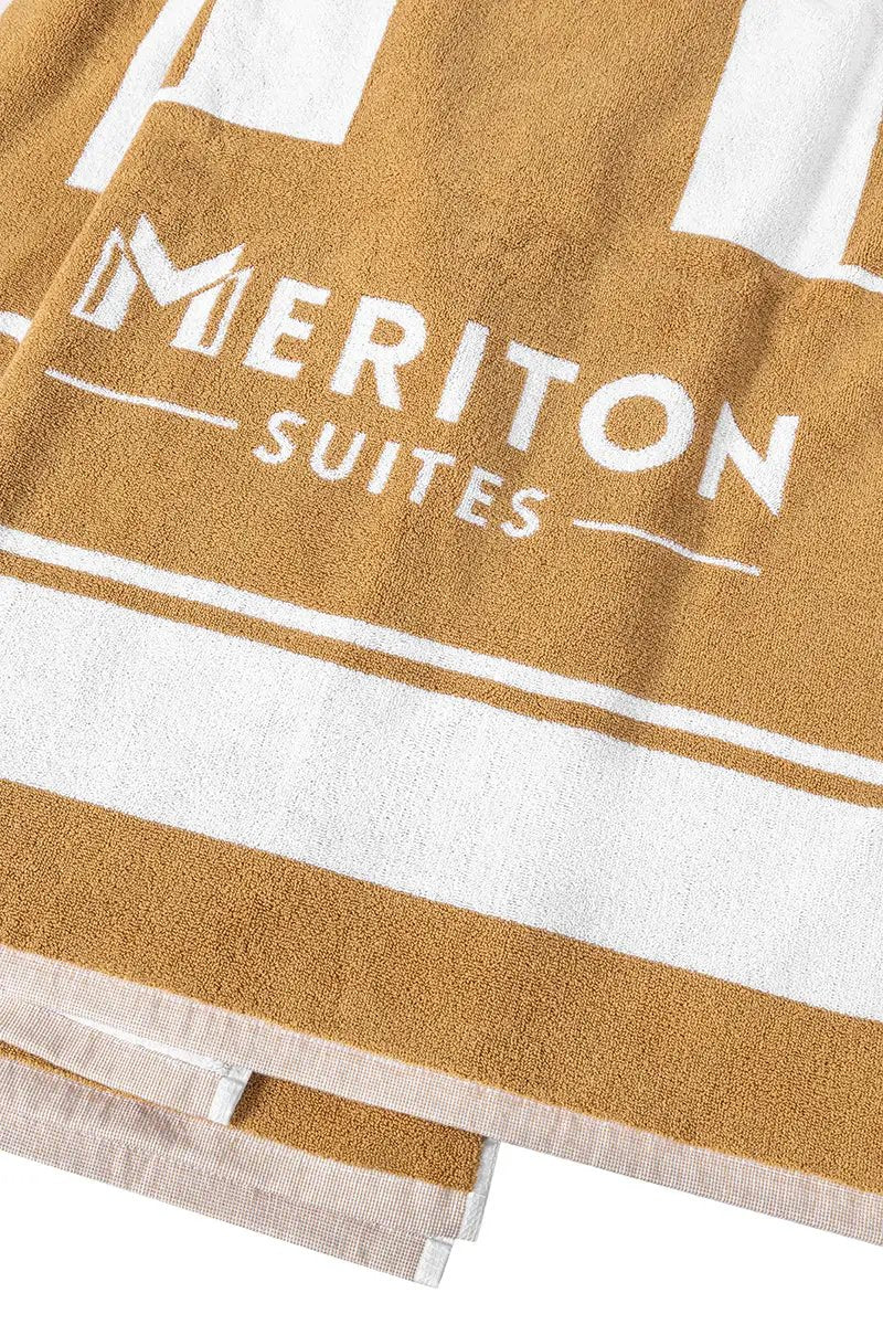 Meriton Suites Beach Towel by Shop Meriton Suites. Shop Meriton Suites