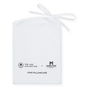 White king pillowcase with 'The Lad Collective' and 'Meriton Suites' branding on a white background.