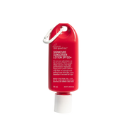 A red squeeze tube of feel good inc. Signature Sunscreen Lotion SPF 50+ with a white cap and a white carabiner clip, shown on a plain white background. Shop Meriton Suites. We are feel good inc. spf sunscreen.